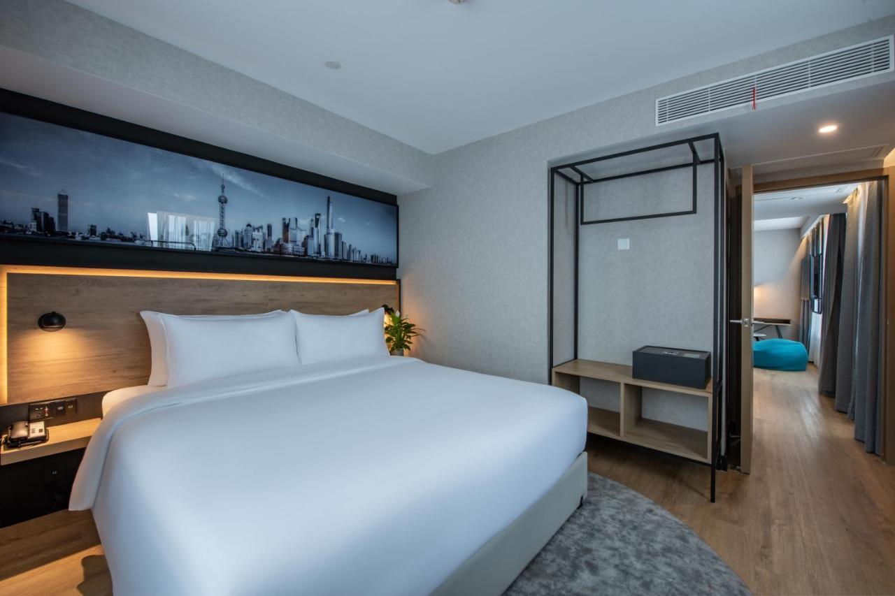 Park Inn By Radisson Shanghai Huanqiugang Buitenkant foto