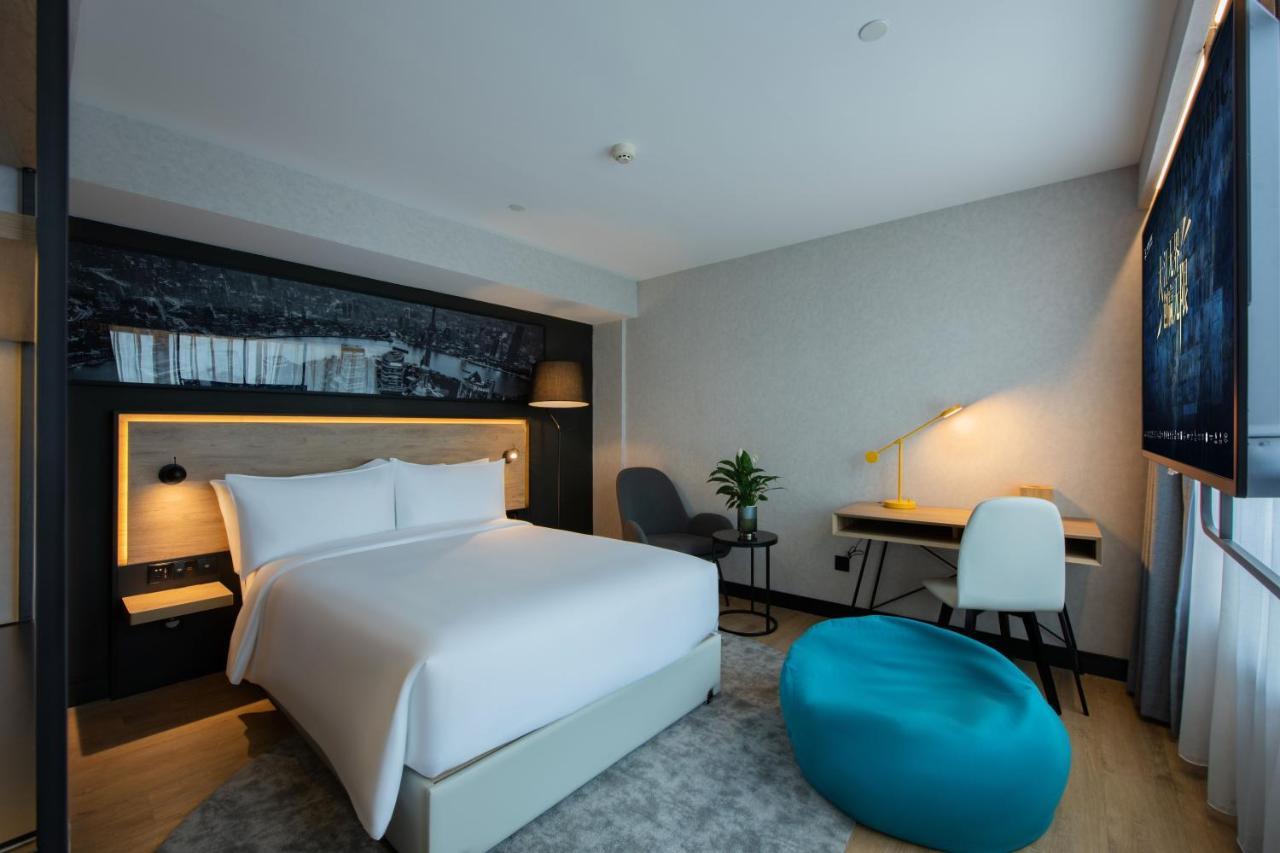 Park Inn By Radisson Shanghai Huanqiugang Buitenkant foto