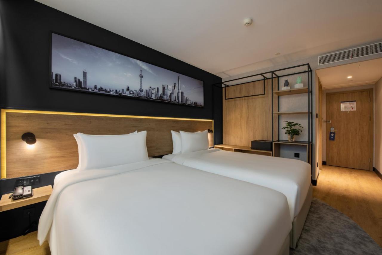 Park Inn By Radisson Shanghai Huanqiugang Buitenkant foto
