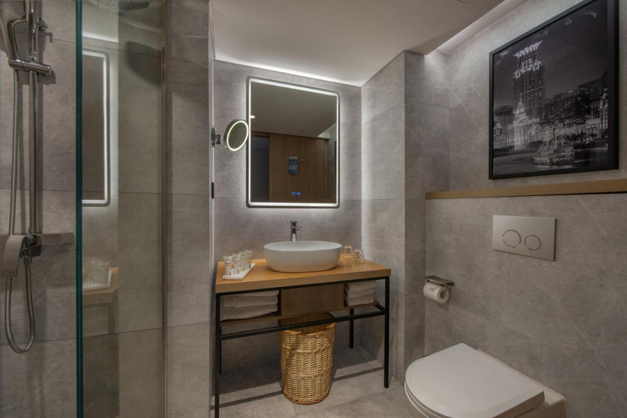 Park Inn By Radisson Shanghai Huanqiugang Buitenkant foto